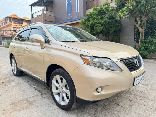 Lexus RX 350 year 2010 gold color very nice car