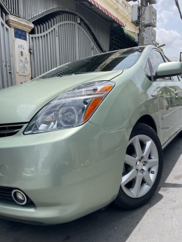 តម្លៃ​ចចារ​  Pruis 07 Touring  ហ្វូលអុបសិន  ពណ៌​ទឹកសណ្តែក(ហ្គិច)​ ​ សន្លឹក​ពន្ធ​ថ្មី​
