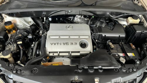 ឡានលក់ LEXUS RX330 ឆ្នាំ06 full option ពេញ ប៉ុង1 ក្នុងលឿង ពណ៌ស