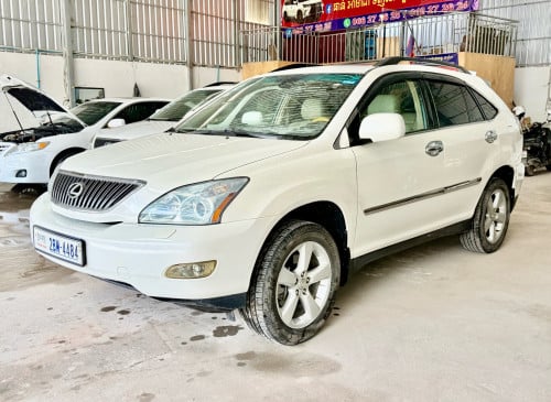 ឡានលក់ LEXUS RX330 ឆ្នាំ06 full option ពេញ ប៉ុង1 ក្នុងលឿង ពណ៌ស