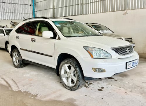ឡានលក់ LEXUS RX330 ឆ្នាំ06 full option ពេញ ប៉ុង1 ក្នុងលឿង ពណ៌ស