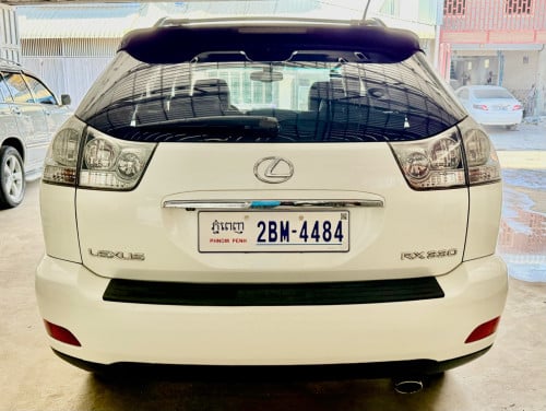 ឡានលក់ LEXUS RX330 ឆ្នាំ06 full option ពេញ ប៉ុង1 ក្នុងលឿង ពណ៌ស