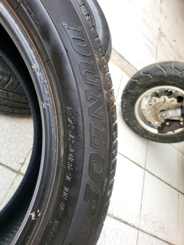សំបកកង់ឡាន 570 DUNLOP R21 មួយទឹក