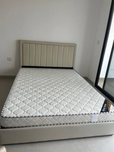 Bed with mattress