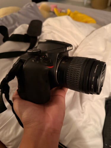 Nikon Camera D3400 with 18-55mm lens and 70-300mm lens included