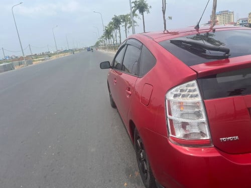 Toyota Prius 08 ពណ៍ក្រហម ឡានស្អាត អត់មានបុកប៉ះ ច្រេះកាត់តស្ងោរដូរពណ៍ទេលក់