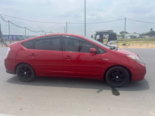 Toyota Prius 08 ពណ៍ក្រហម ឡានស្អាត អត់មានបុកប៉ះ ច្រេះកាត់តស្ងោរដូរពណ៍ទេលក់