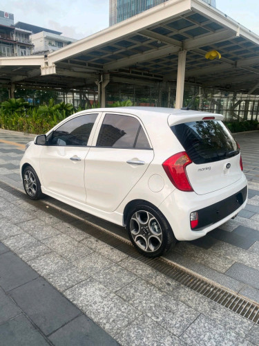Kia morning ឆ្នាំ2014 full option បើកដំបូល f sport ឈ្នាន់ហ្គែរវែង ប្រ្វាំងគៀបមុខក្រោយ......