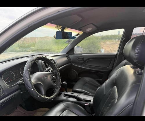 ចង់លក់HYUNDAI SONATA 02 ហ្គាសស្រុីន​ ប្រភេទឡានកម្ររ​