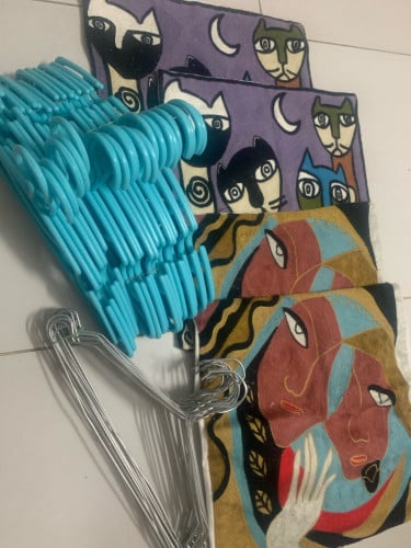 blue and stainless hangers, (4) pillow case and blue basket