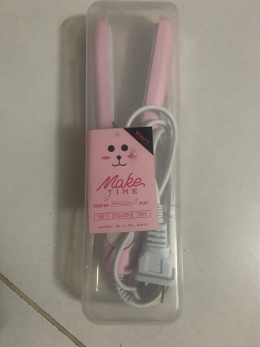 Used pink mini hair straightener