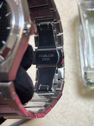 Tissot Automatic PRX Powermatic 80 with a black "Open Heart" dial
