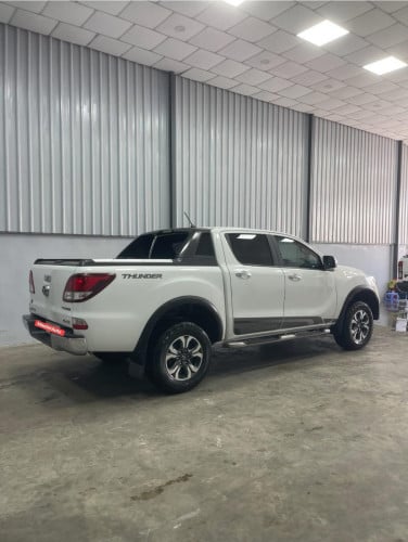 ម្ចាស់ដេីមមហាថ្មីខ្លាំង Mazada Thunder Full option 2020 3.2L