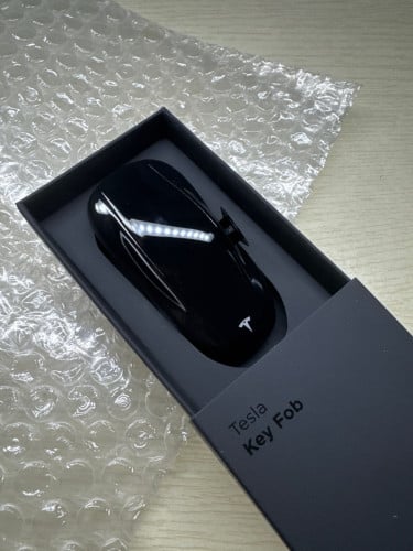 Brand New Tesla Keyfob Model 3/Y ថែមស្រោមសោរជូន