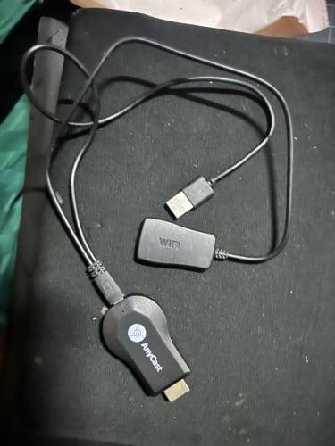 Anycast M9 wifi resolution 1080p Full HD  HDMI  TV stick. Condition :98%