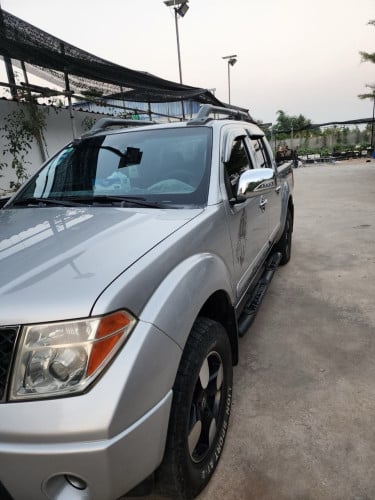 Nissan Frontier ឆ្នាំ 2005 រៀបចំហើយស្អាត Full ពេញ មានបើកដំបូល ហ្គាសហើយ