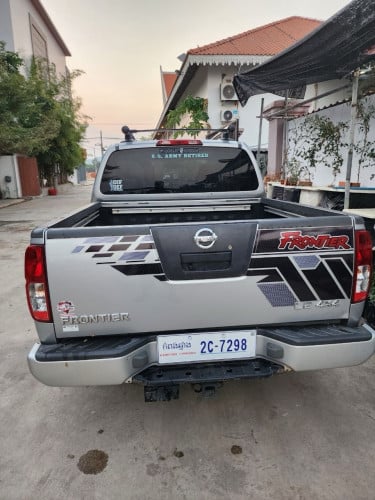 Nissan Frontier ឆ្នាំ 2005 រៀបចំហើយស្អាត Full ពេញ មានបើកដំបូល ហ្គាសហើយ