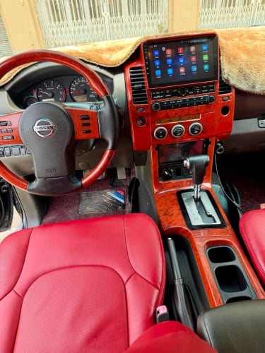 Nissan Navara 06 ម៉ាស៊ូតប៉ុង2អូតូកាពីតាស់ដំបូលបេីកខ្មៅសុីនសំនុំឃ្លាំងម្ចាស់ទី1
