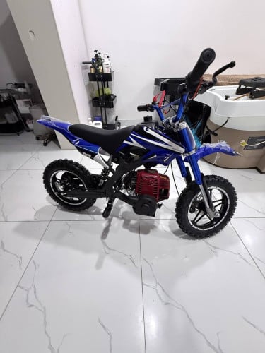 ម៉ូតូកូនក្មេងប្រើសាំង