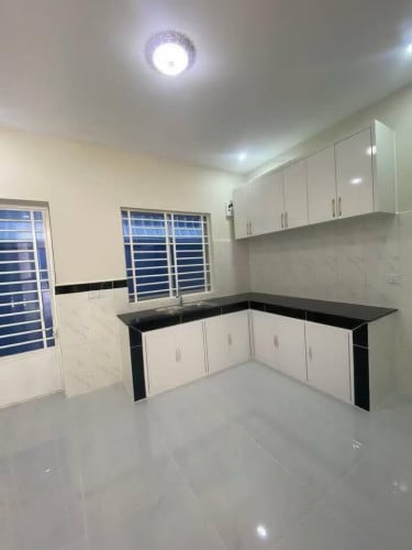 សំណង់ផ្ទះល្វែងខាងត្បូងផ្សារទួលពង្រ