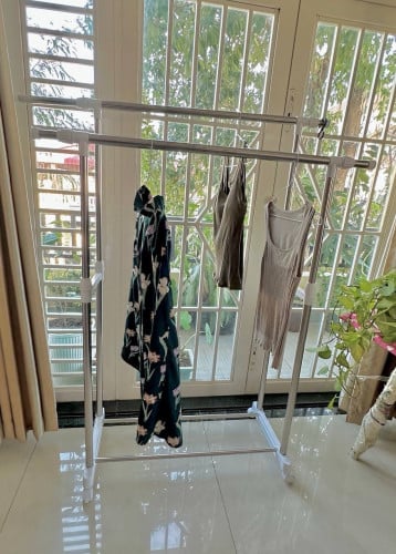 Adjustable Double-Rail Garment Rack on Wheels