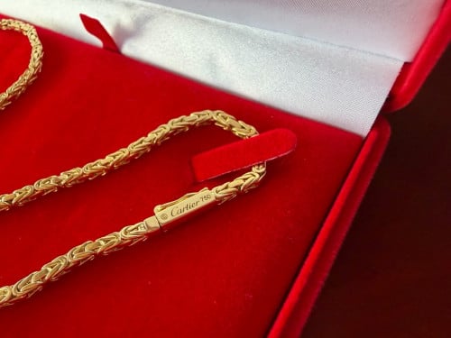 18 karat gold chain with a cross / 750 gold fineness