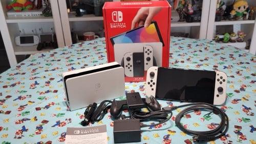 Switch Oled Jailkbreak រួចរាល់ 256g Condition 99% Full Box គ្រឿងនៅជាប់ថង់ទាំងអស់នៅមាន ធានា 1ខែ