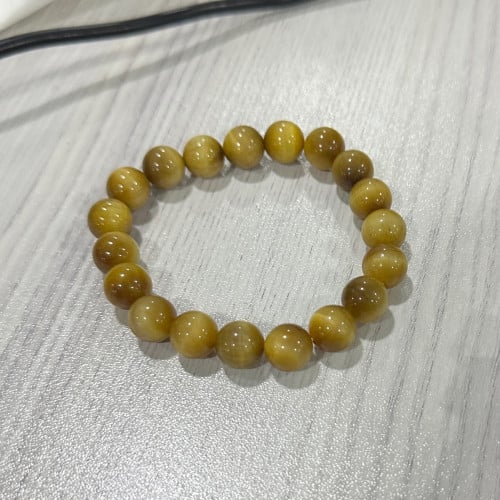 ខ្សែដៃអង្គាំធម្មជាតិ​ gold tiger eye