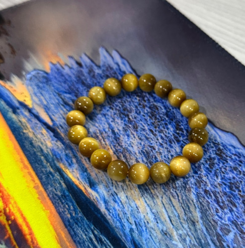 ខ្សែដៃអង្គាំធម្មជាតិ​ gold tiger eye