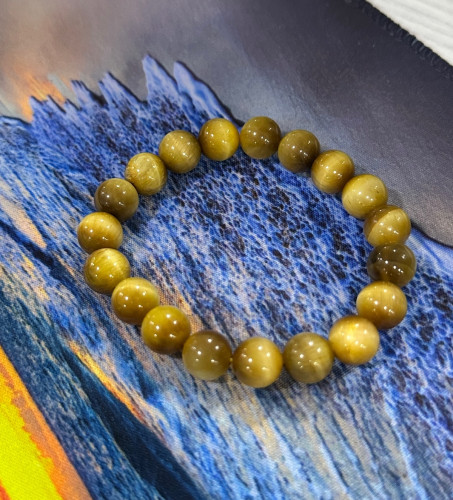 ខ្សែដៃអង្គាំធម្មជាតិ​ gold tiger eye