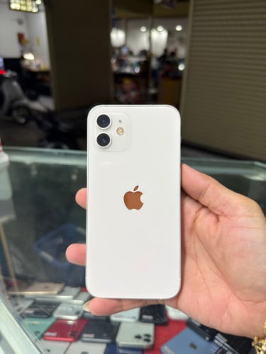 iPhone 12 White LL/A HD64GB Phone Condition 97% 🔋88% , ម៉ាស៊ីនសានុំ