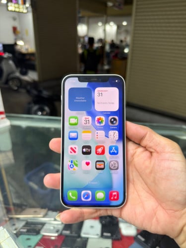 iPhone 12 White LL/A HD64GB Phone Condition 97% 🔋88% , ម៉ាស៊ីនសានុំ