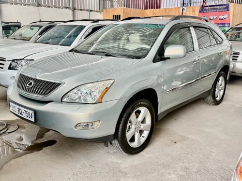ឡានលក់ LEXUS RX330 ឆ្នាំ04 ពាក់កណ្ដាល full option ប៉ុង1 ក្នុងលឿង ពណ៌ផ្សែងបារី ជាប្រភេទមេឡាន