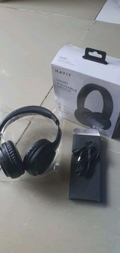 កាសធំប្រើ bluetoothសំឡេងបុកបាសស្អាតថ្មកាន់ ថ្មីប្រអប់