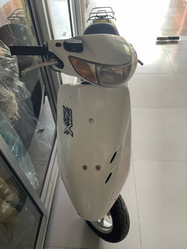 Honda Dio ពណ៍សប្រភេទម៉ូតូក្រដាស់ពន្ធ តំលៃ 290$