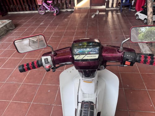 ម៉ូតូ លក់ សង់តែមឆេះ ក្រដាស់ពន្ធ