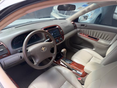 Camry (បាឡែន) 2003 LE ABS ពណ៍សកៅអីចុចសងខាង ទឹកថ្នាំហ្សុីន 90%