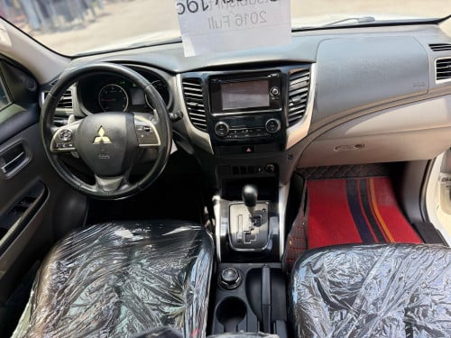 Mitsubishi Triton 2016 ប៉ុង2full ម៉ាស៊ីន​ មម៉ាស៊ូតលេងAE-