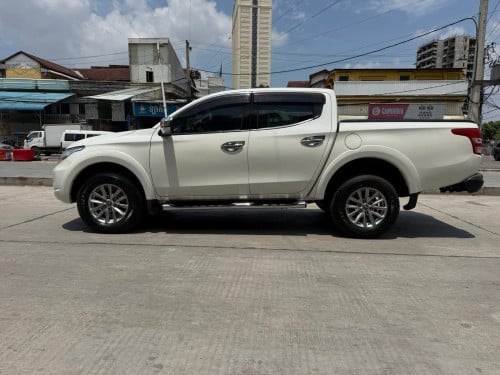 Mitsubishi Triton 2016 ប៉ុង2full ម៉ាស៊ីន​ មម៉ាស៊ូតលេងAE-