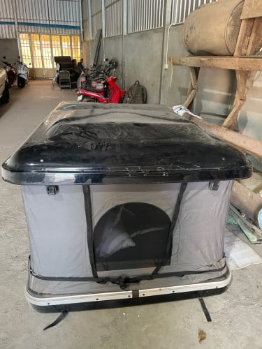 តង់គេងលេីដំបូល