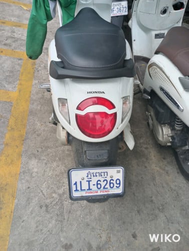 Scoopy I ម៉ូតូក្រុមហ៊ុនលក់ ម៉ូតូជិះផ្ទាល់ខ្លួន