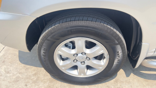 Highlander V4 ប៉ុង1 ឆ្នាំ2003 ពណ៍ទឹកប្រាក់
