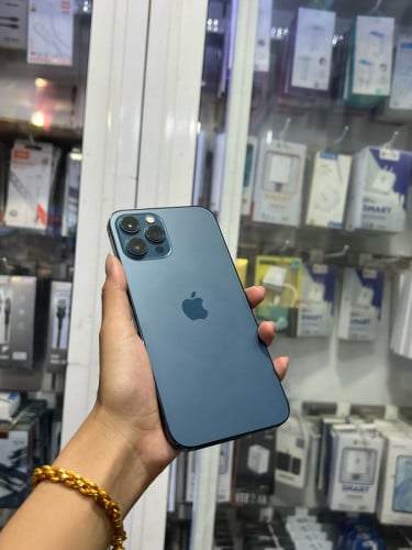 iPhone 12pro max 🍏 ពណ៌ខៀវ 128GB LLA Battery 95% 🔋 តួស្អាត 99% សំណុំហ្សីន អត់ជាប់អី(ធានា1ខែ)