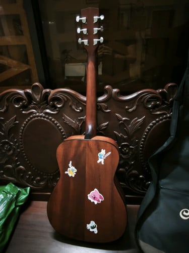 Cort acoustic guitar ចរចារបាន