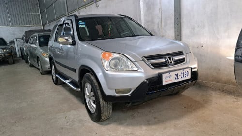ដំណឹងលក់ឡានស្អាត Honda CR-V ឆ្នាំ03 បើកដំបូល​មាន(ABS)