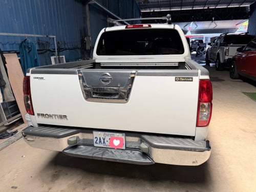 Nissan Frontier 05 ប៉ុង1ដំបូលបេីកហ្វូលអប់សិនរំលស់សុត100%
