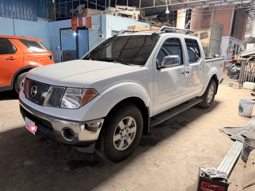 Nissan Frontier 05 ប៉ុង1ដំបូលបេីកហ្វូលអប់សិនរំលស់សុត100%