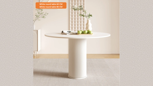 " Paris Design Studio " Round table with a smooth stone top.