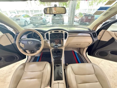Highlander 02 V6 បេីកបូល