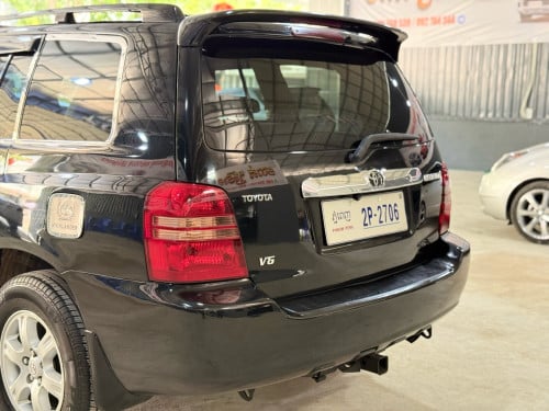 Highlander 02 V6 បេីកបូល